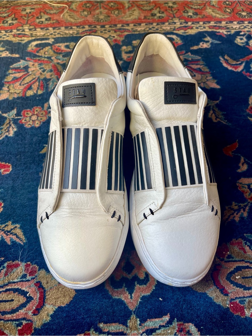 White Slip-On Leather Sneakers with Black Stripe Detail